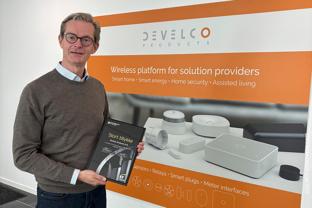 CEO Karsten Ries holding the award nomination